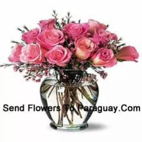 12 Pink Roses With Some Ferns In A Vase